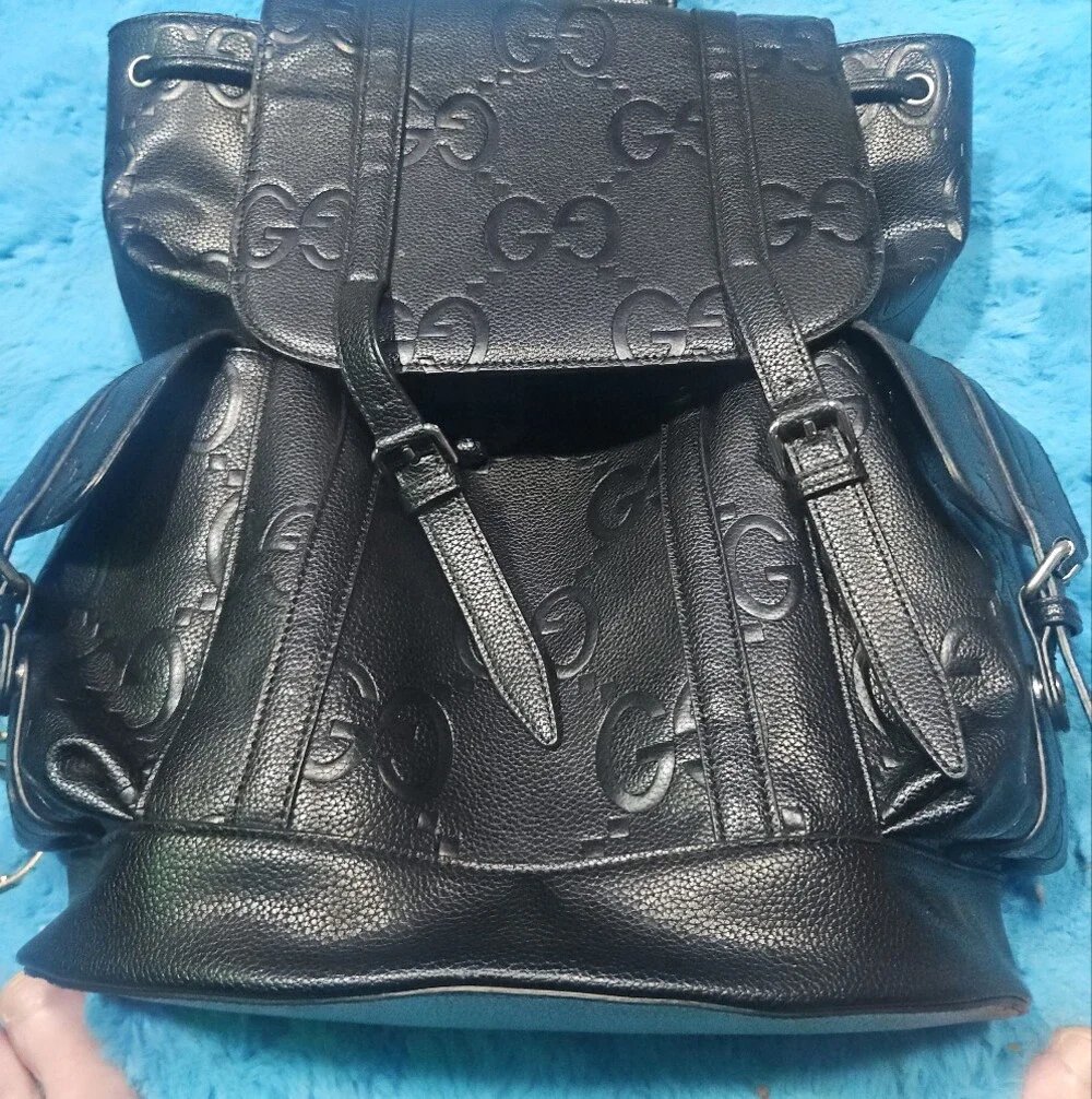Gucci Black Embossed GG Leather Drawstring Backpack